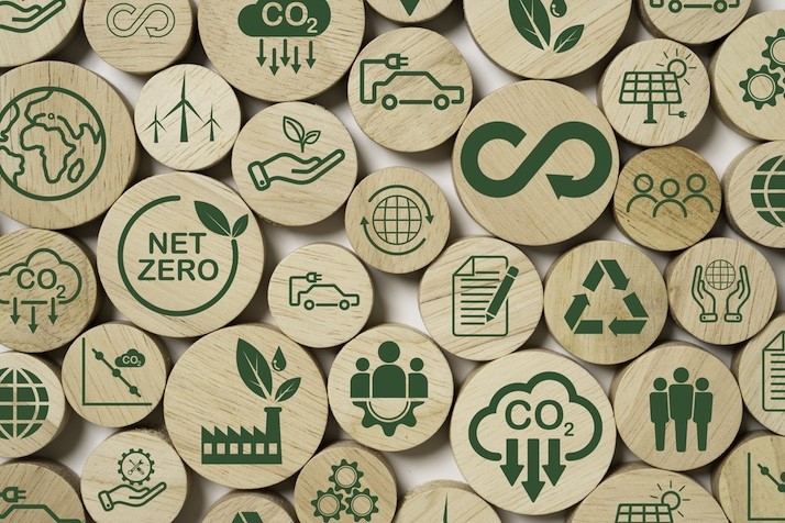 environmental policy degree icons on wooden chips