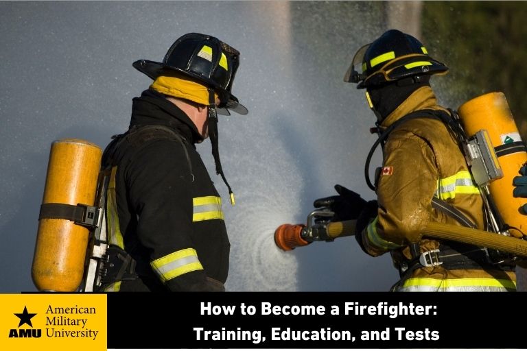 how-to-become-a-firefighter firefighter holding hose spraying water on flames
