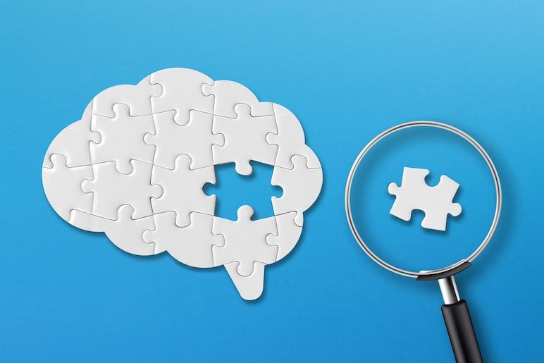 research psychology depicted by missing puzzle piece under magnifying glass