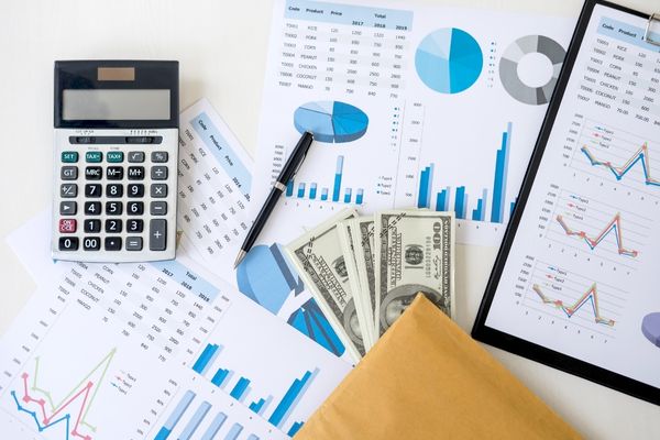 aerial view of calculator and business documents