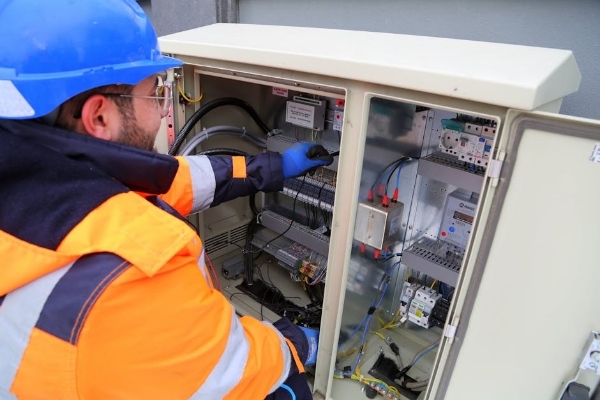 electrical engineer looking at electrical components