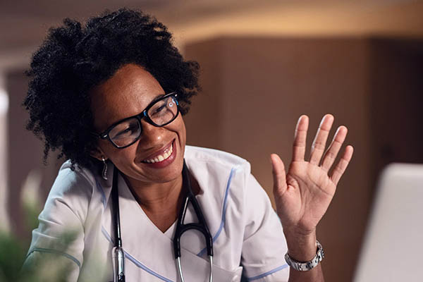 nurse smiling during virtual appointment